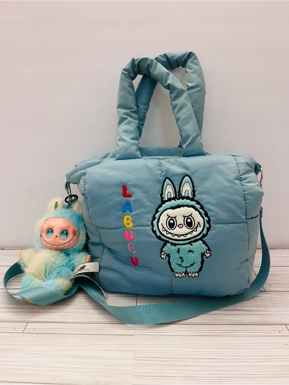 Labubu quilted puffer zipper bag with key chain lights blue green